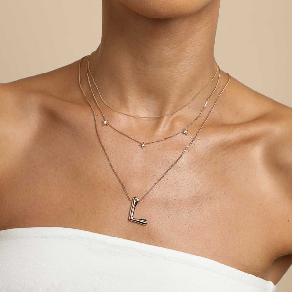 Astrid & Miyu L Initial Bold Pendant Necklace In Gold