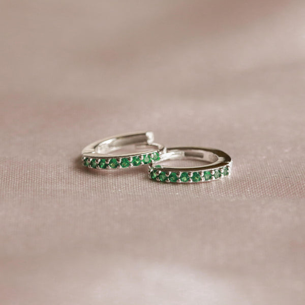 Astrid & Miyu May Birthstone Huggies In Silver With Emerald CZ