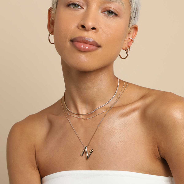 Astrid & Miyu N Initial Bold Pendant Necklace In Gold