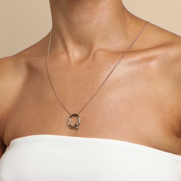 Astrid & Miyu Q Initial Bold Pendant Necklace In Gold