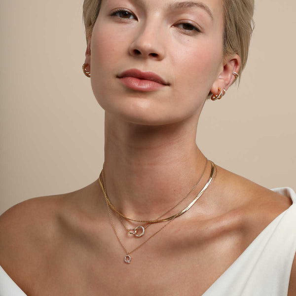 Astrid & Miyu Q Initial Pavé Pendant Necklace In Gold