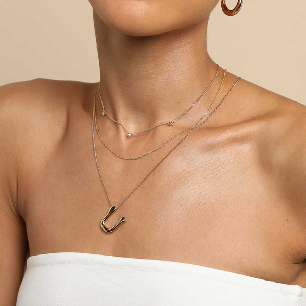 Astrid & Miyu U Initial Bold Pendant Necklace In Gold