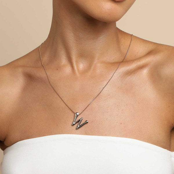 Astrid & Miyu W Initial Bold Pendant Necklace In Gold