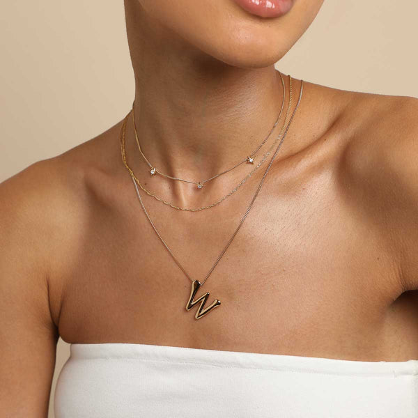 Astrid & Miyu W Initial Bold Pendant Necklace In Gold