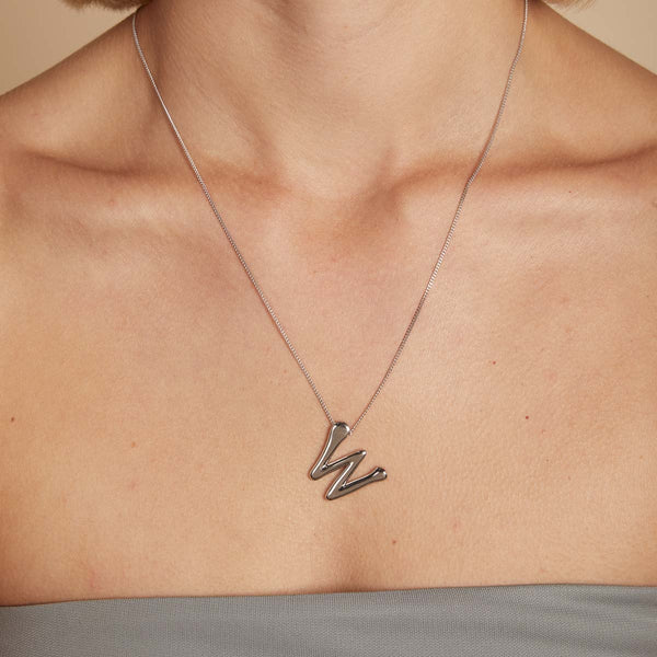 Astrid & Miyu W Initial Bold Pendant Necklace In Silver