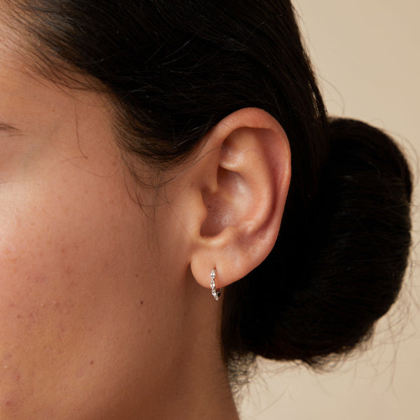 Astrid & Miyu White Topaz Marquise Huggies In Solid White Gold