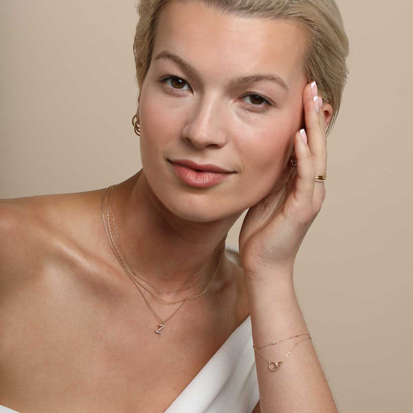 Astrid & Miyu Z Initial Pavé Pendant Necklace In Gold
