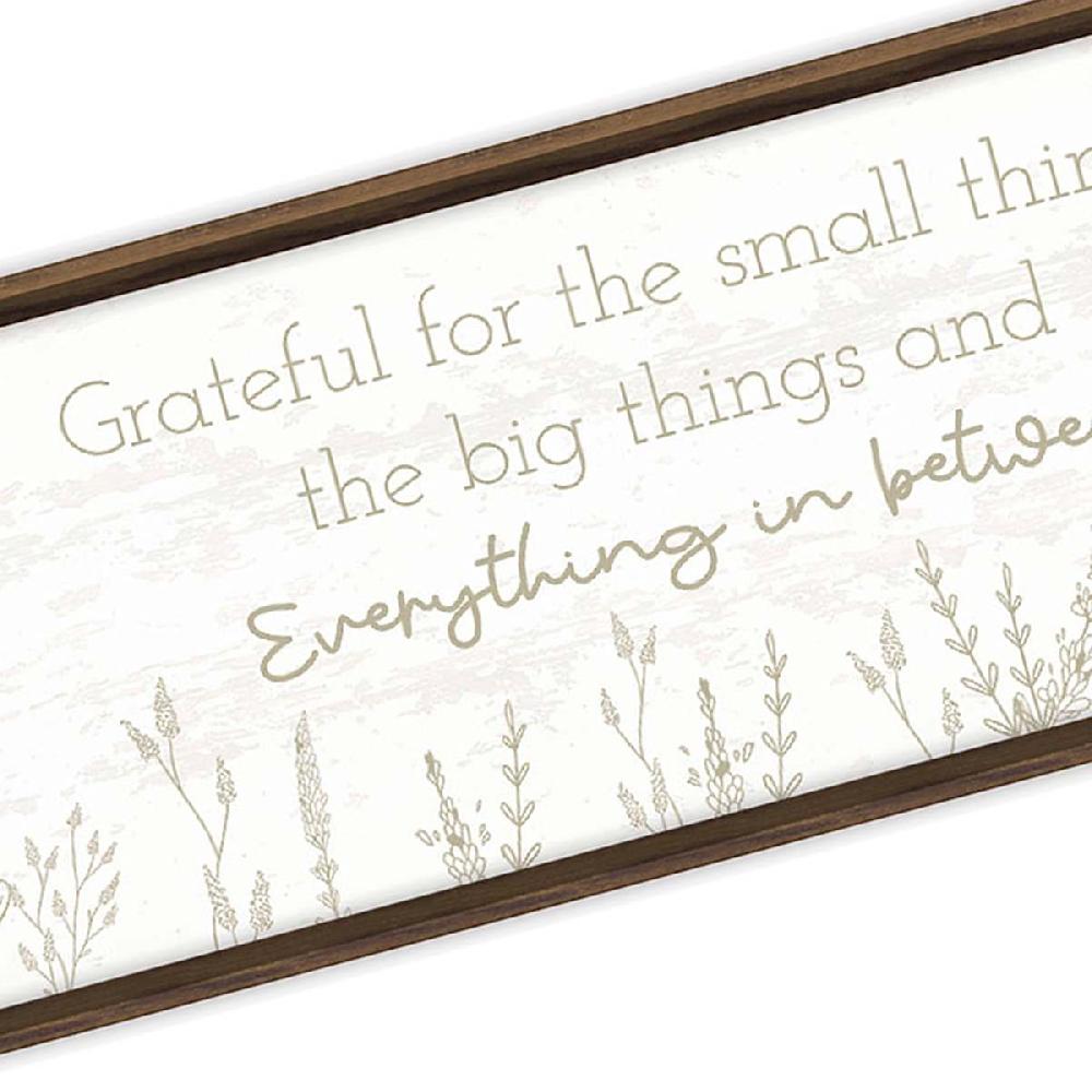 At Home Everything In Between Wall Sign 12x36