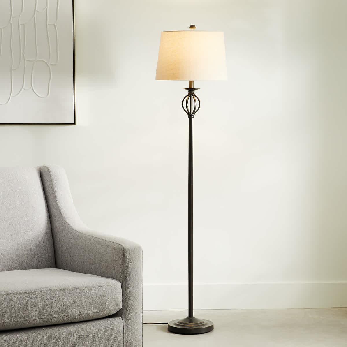 At Home Bronze Finish Spindle Floor Lamp With Oatmeal Fabric Drum Shade 60"