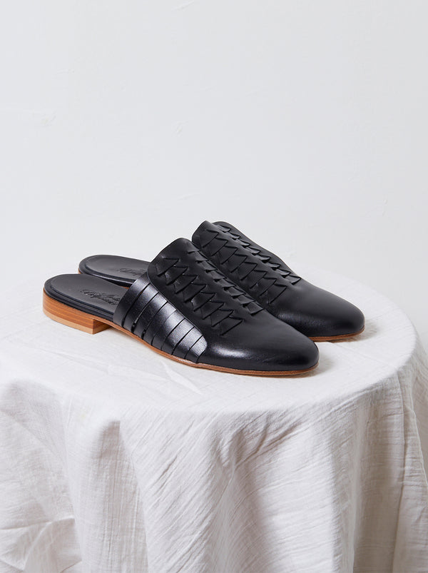 atelier delphine Leather Woven Slides in Black