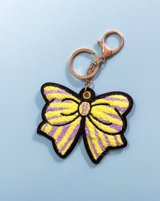 ban do Purple + Yellow Striped Bow Bag Charm