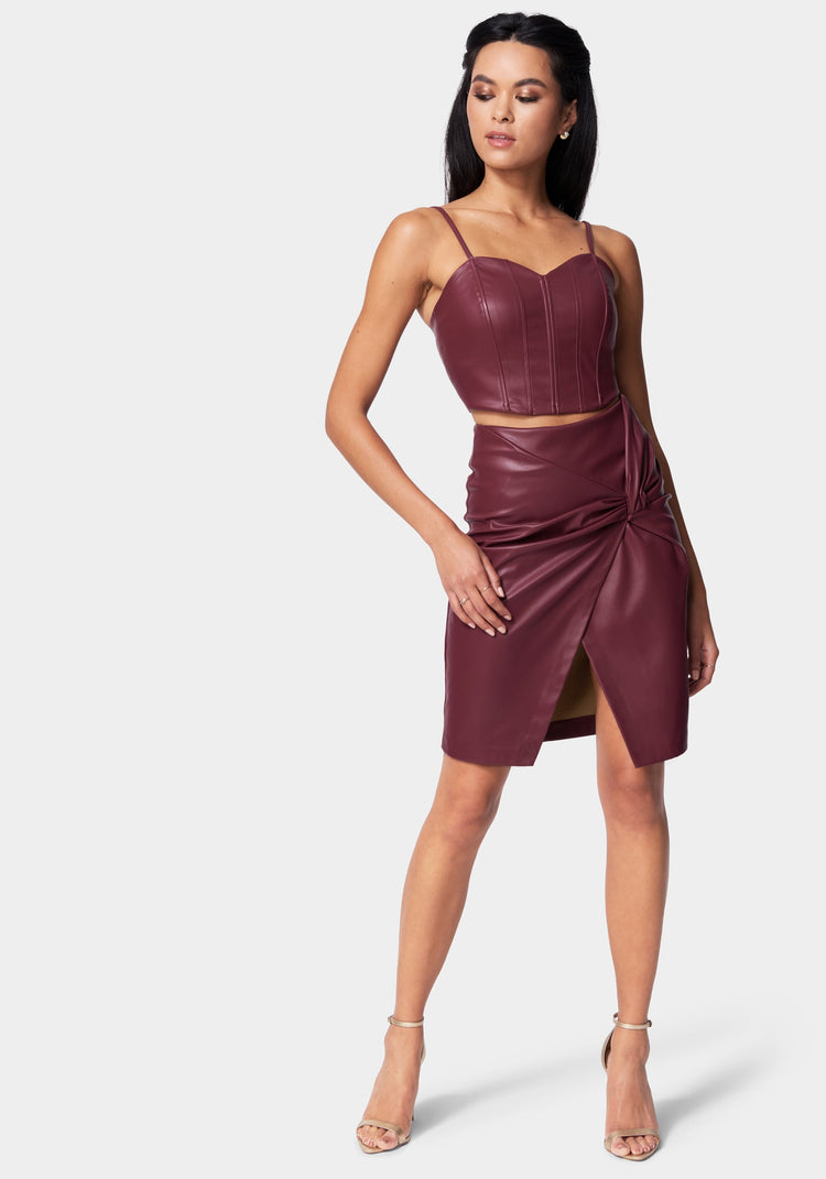 Bebe Vegan Leather Knot Front Skirt
