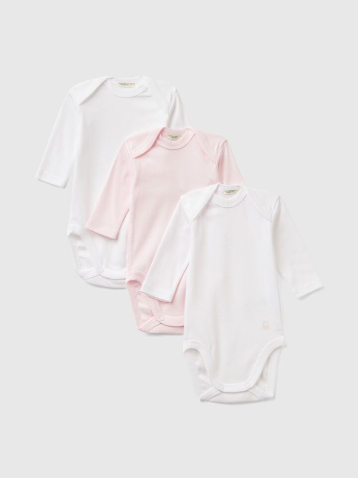 benetton Three solid color bodysuits in cotton Multi-color