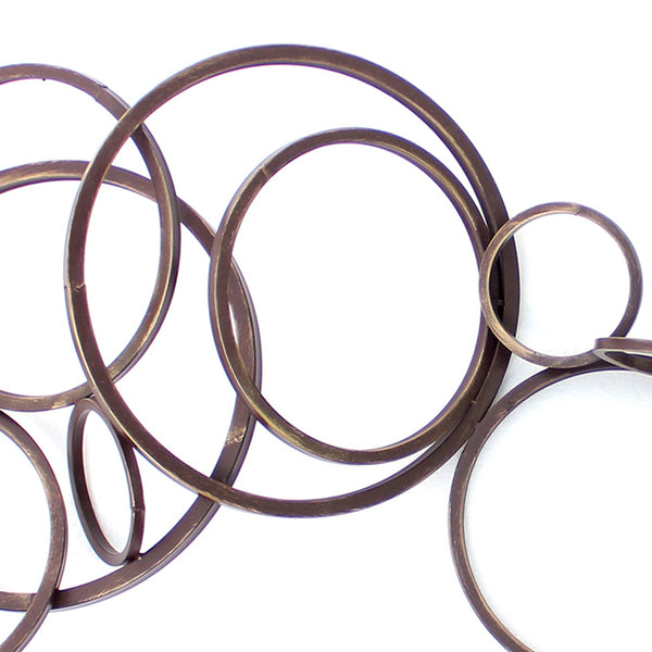 Benzara Industrial Style Metal Wall Decor With Multiple Circles Bronze - BM209107