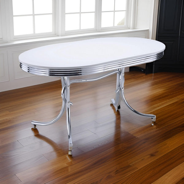 benzara Loy 60 Inch Oval Dining Table Glossy White Wood Top Ribbed Chrome Apron - BM302427