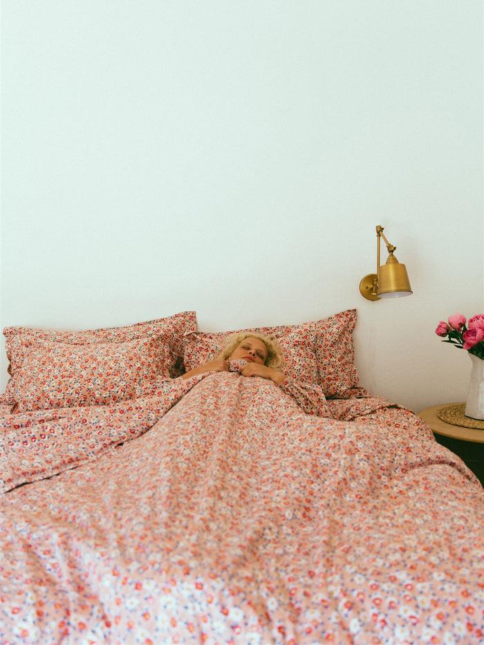 bliss and mischief Duvet Cover in Daisy Peachskin