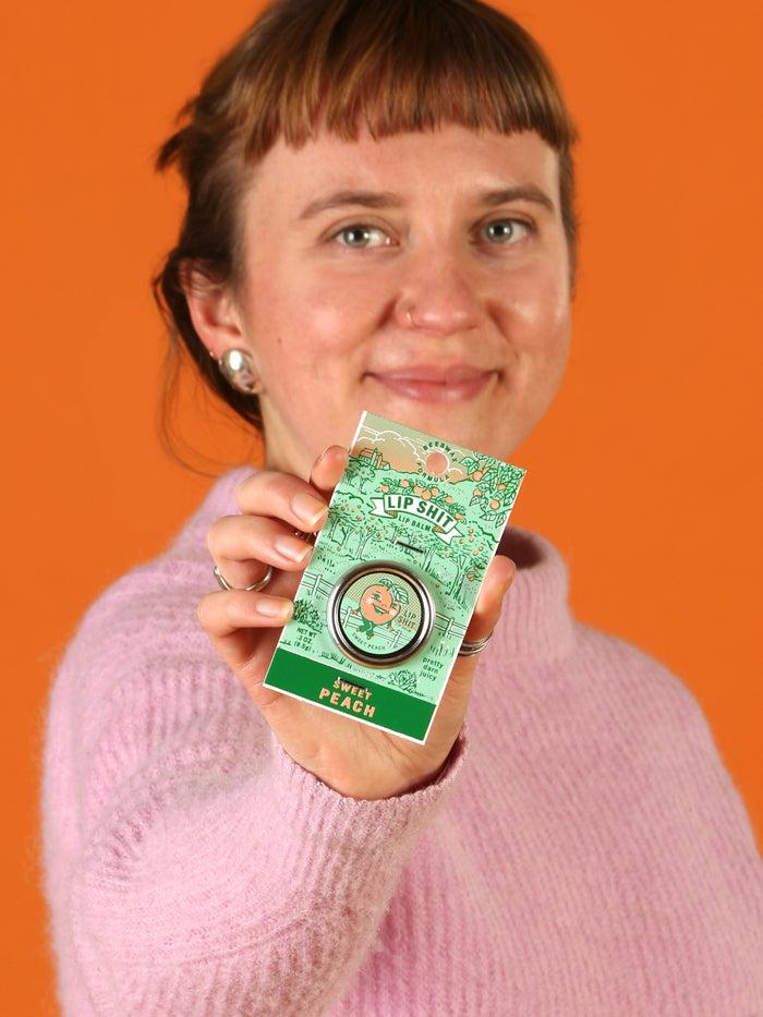 Blue Q Lip Shit Lip Balm-Sweet Peach