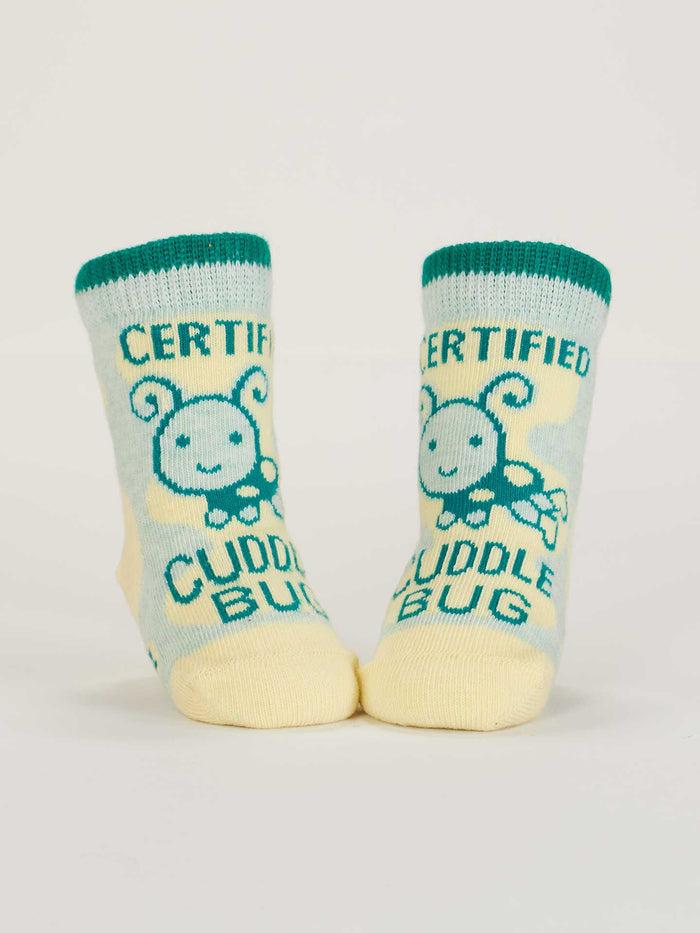 Blue Q Certified Cuddle Bug/I Bet I Can Make Us Both Cry Baby Socks