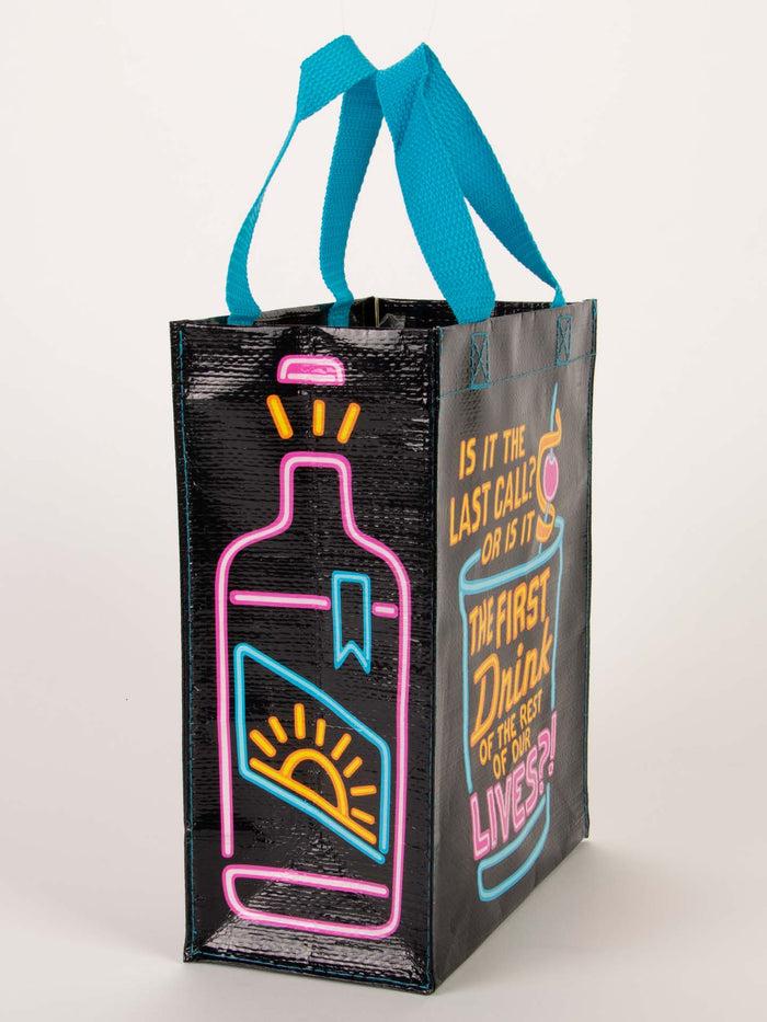 Blue Q Is It The Last Call Or The First Drink Of The Rest Of Our Lives Handy Tote