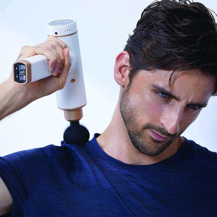 Brookstone Kitta - Performance Percussive Sports Therapy Massage Gun By Synca Massage Chair