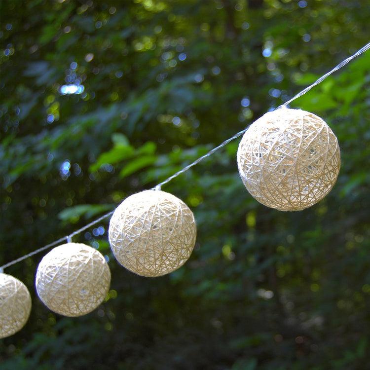 brookstone Solar Powered String Lights with 20 Warm White Cotton Globes