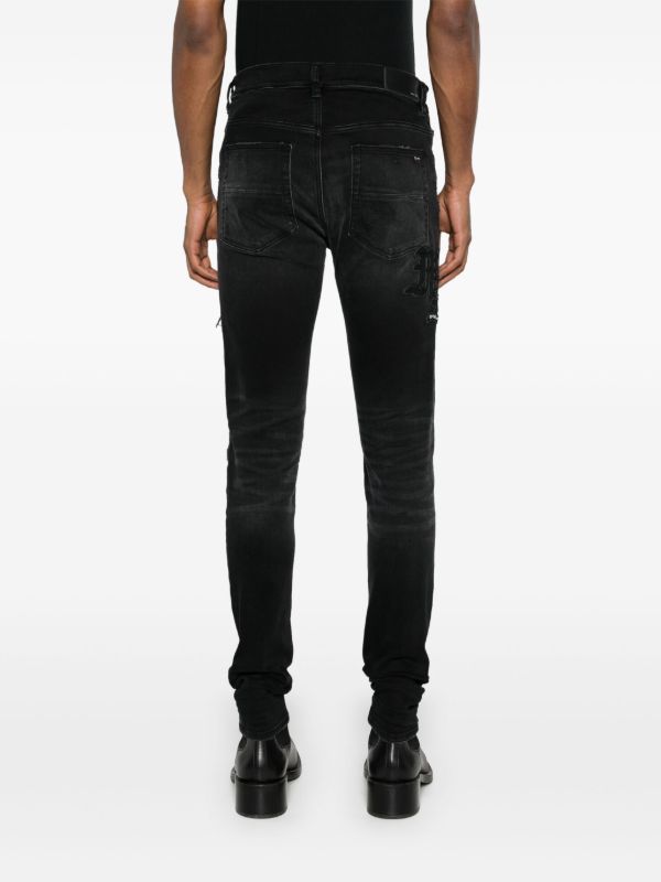 Browns AMIRI Black Ripped Skinny Jeans | Browns Skinny Jeans