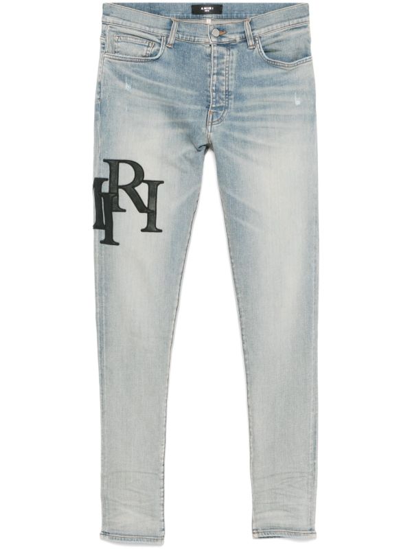 Browns AMIRI Staggered-Logo Jeans | Browns Skinny Jeans