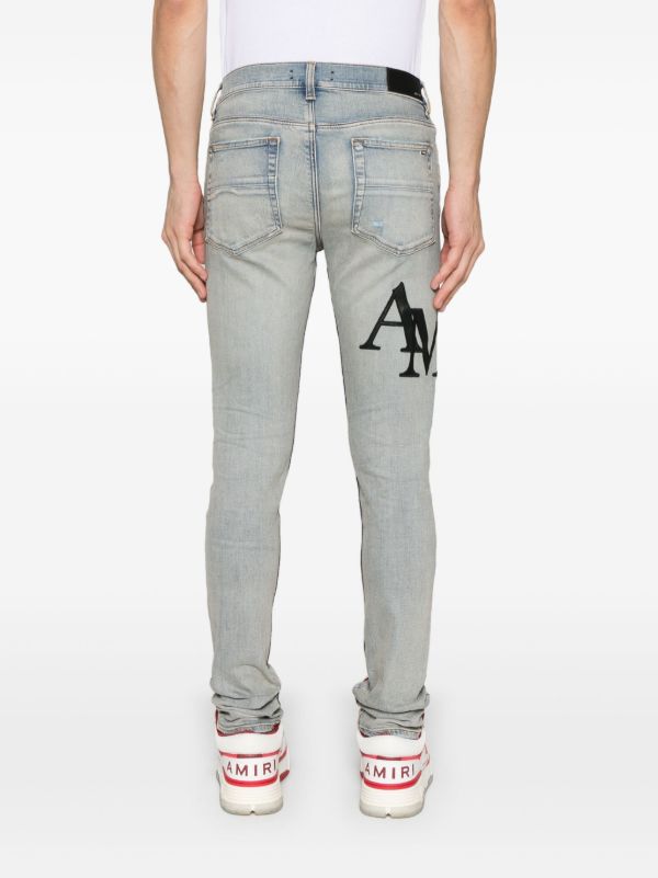 Browns AMIRI Staggered-Logo Jeans | Browns Skinny Jeans