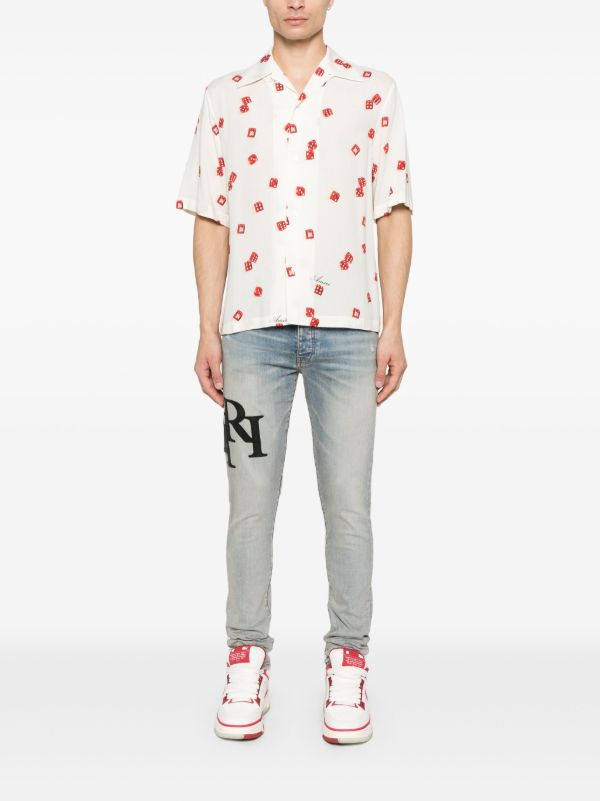 browns AMIRI Staggered-Logo Jeans | Browns Skinny Jeans