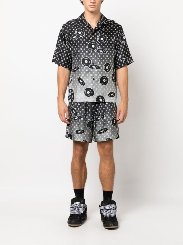 Browns AMIRI X Browns Black Falling Records Silk Shorts | Browns Bermuda Shorts