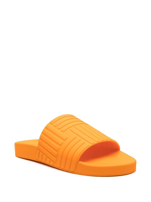 Browns Bottega Veneta Orange Embossed Rubber Slides | Browns Sandals