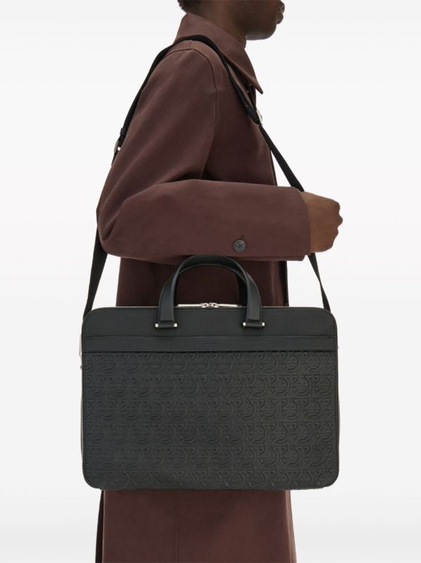 Browns Ferragamo Black Monogram Embossed Leather Briefcase | Browns Laptop Bags & Briefcases