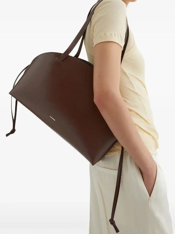 Browns Jil Sander Medium Curved Shoulder Bag | Browns Shoulder Bags