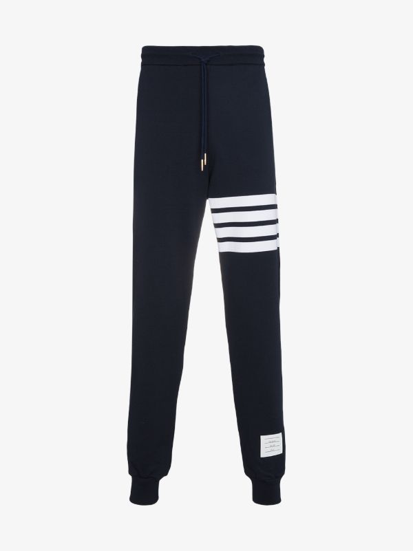 browns Thom Browne blue 4-Bar stripe cotton track pants | Browns Sweatpants