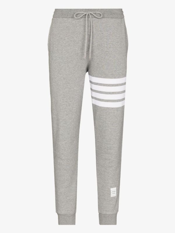 browns Thom Browne grey 4-bar stripe track pants | Browns Sweatpants