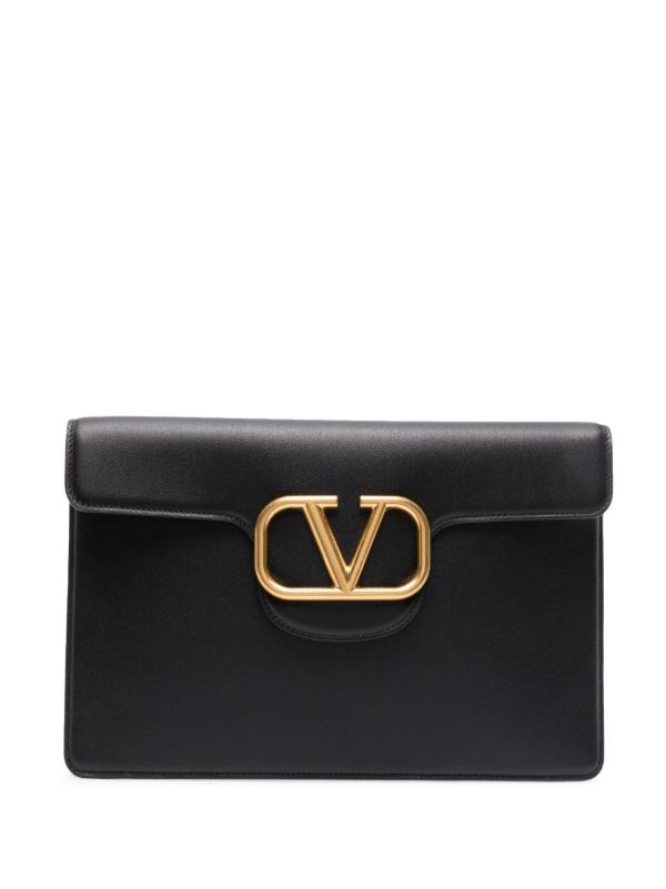 browns Valentino Garavani Black Locò Leather Clutch Bag | Browns Clutch Bags