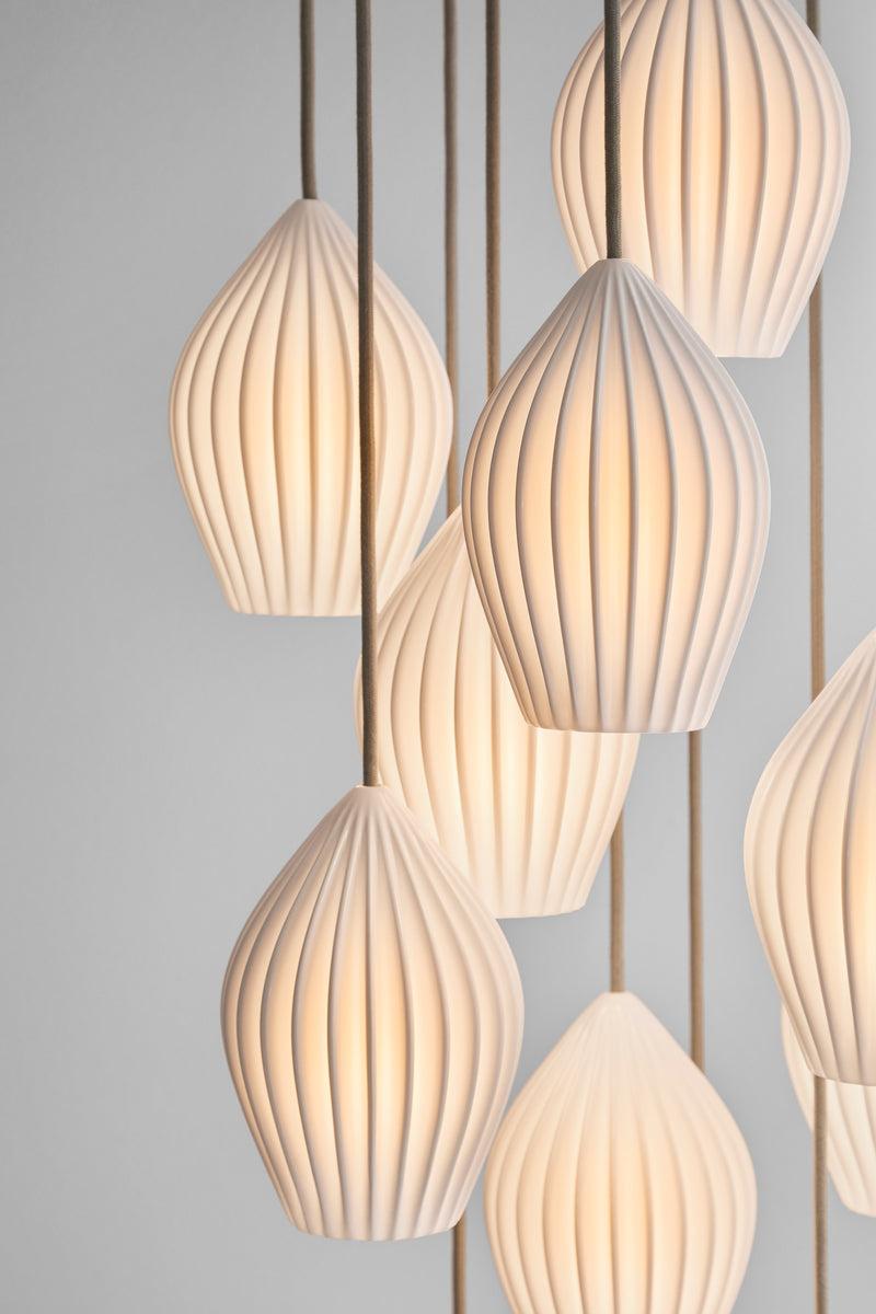 Btc Fin Pendant Grouping Of 12 Natural White