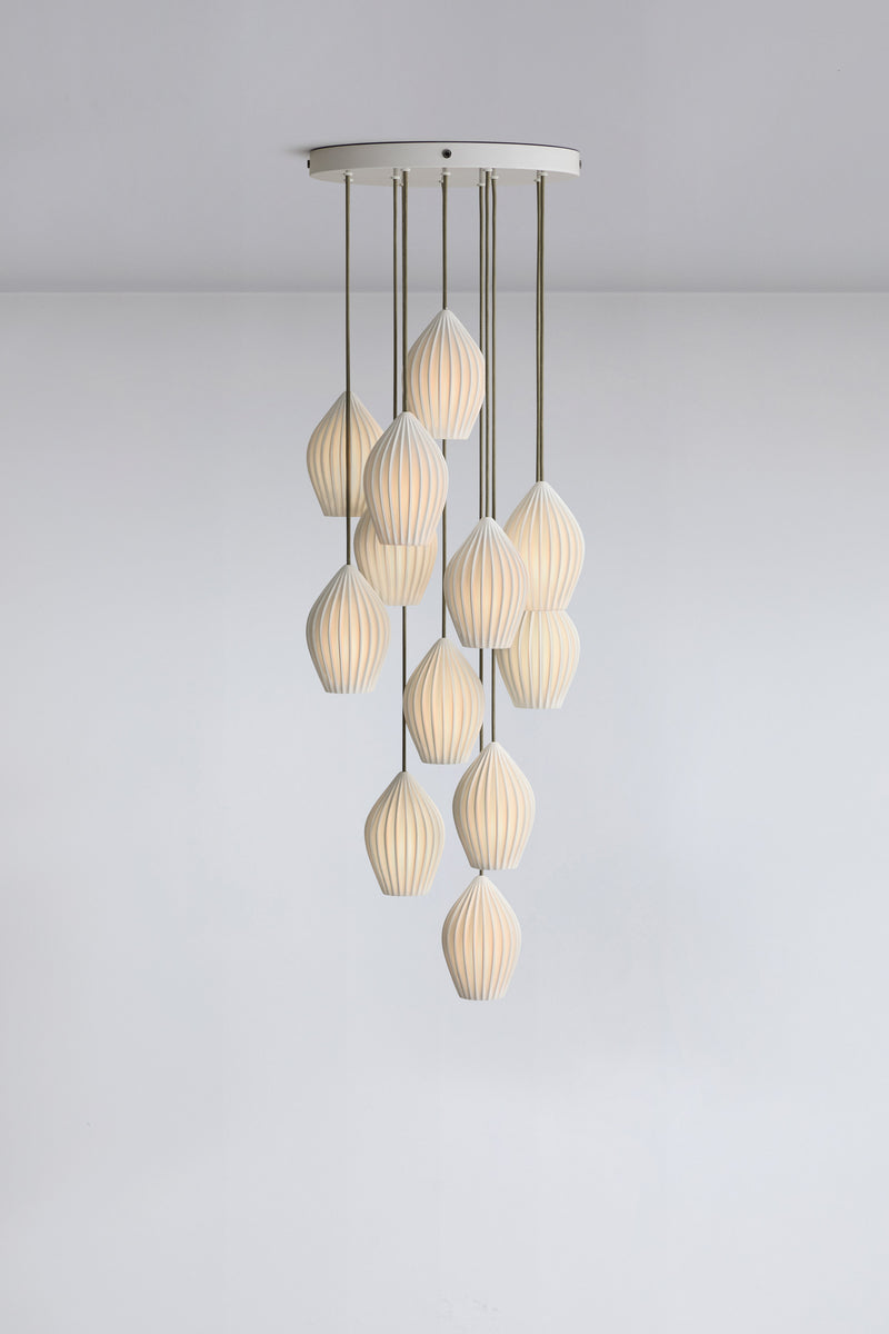 btc Fin Pendant Grouping of 12 Natural White