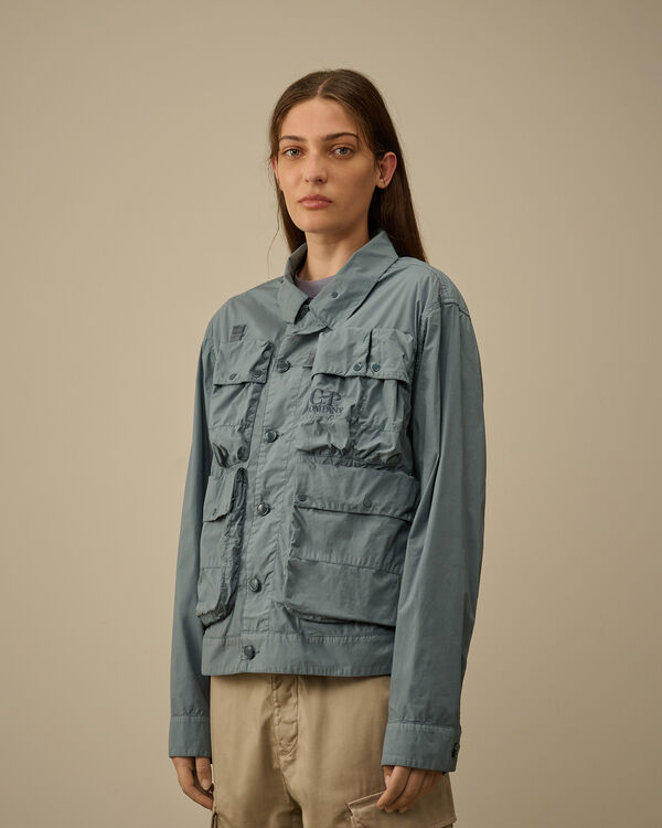 C.p. Company 50 Fili Stretch Short Multi-Pocket Jacket STORMY WEATHER - BLUE
