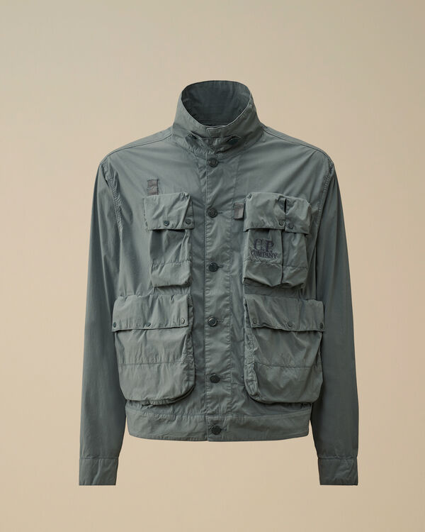 c.p. company 50 Fili Stretch Short Multi-Pocket Jacket STORMY WEATHER - BLUE