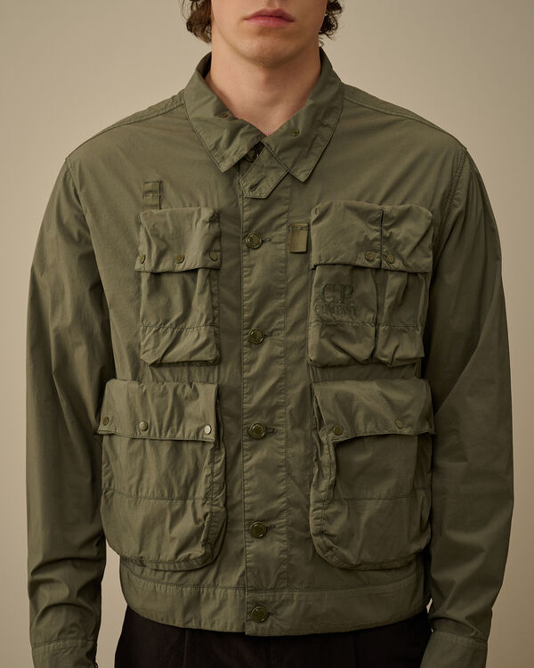 C.p. Company 50 Fili Stretch Short Multi-Pocket Jacket THYME - GREEN