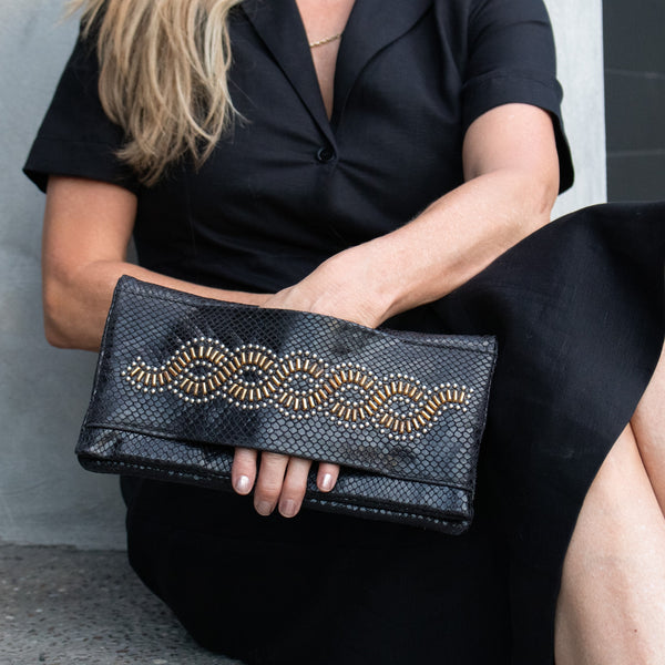 Calleen Cordero Fava Topaz Clutch Linen Lizard W/ Brass & Nickel Art