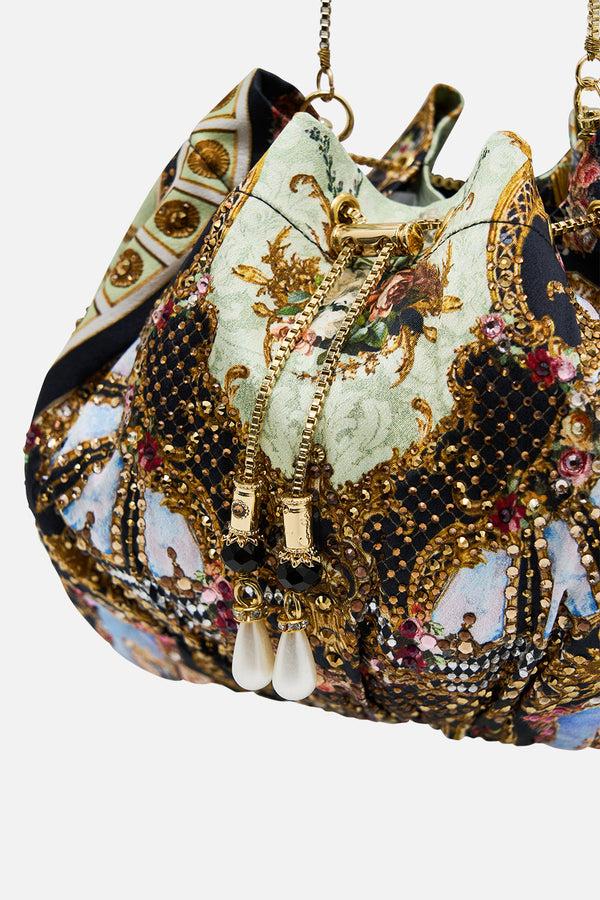 camilla drawstring pouch with chain strap