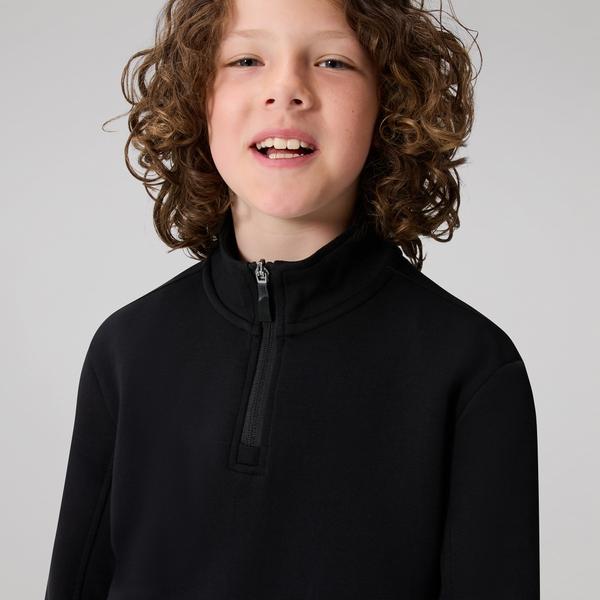 Canterbury Of New Zealand KIDS TEMPO+ QUARTER-ZIP SWEATER BLACK