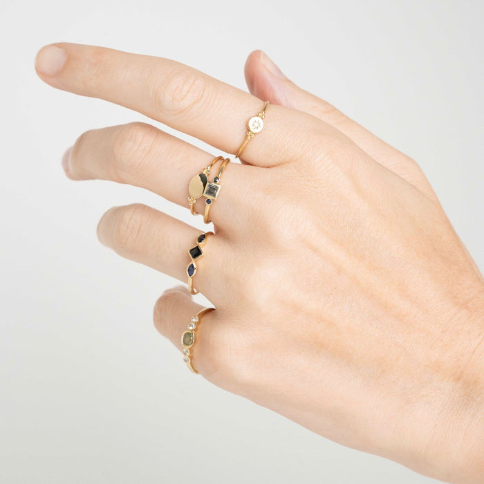 Capi Deco Ring With 2 Marquise And 1 Square Cut Blue Sapphire