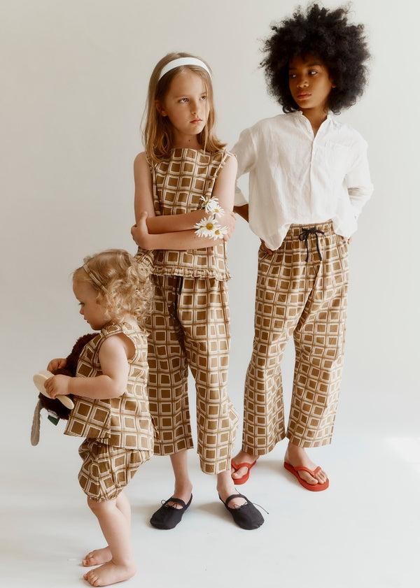 Caramel JUDO CHILDREN'S TROUSERS - BROWN GEO PRINT
