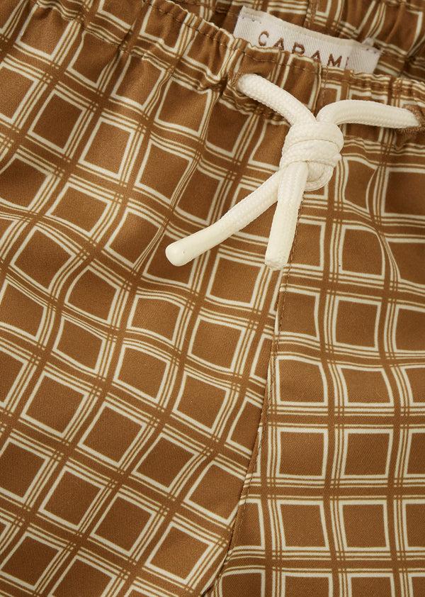 Caramel KOHLRABI BABY SWIM SHORTS - BROWN GEO PRINT