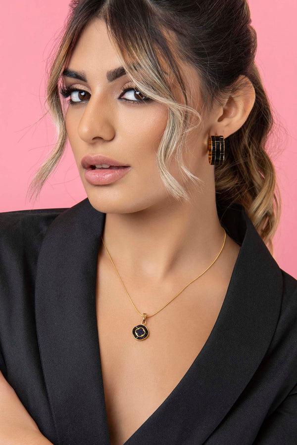 Carisma Faniello's Black Enamel Hoop Earring Set