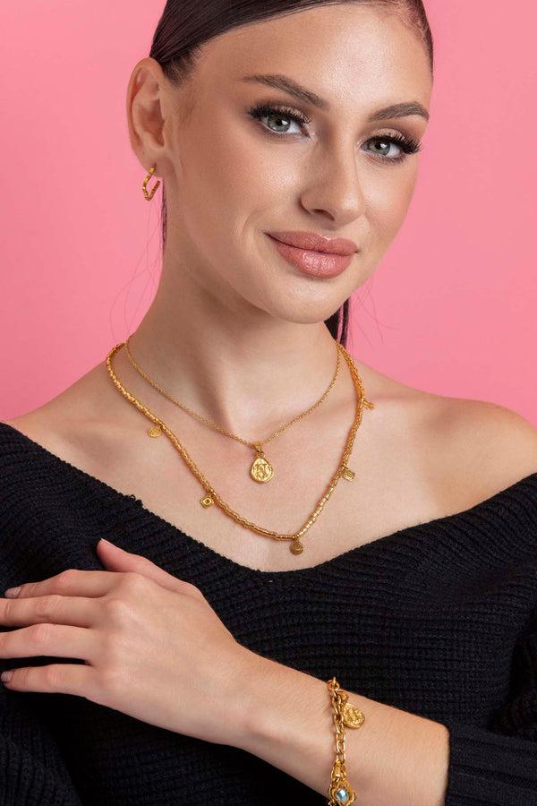 Carisma Gini's Gold Beaded Necklace