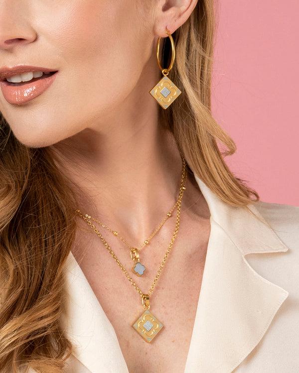 Carisma Rock Quartz Logo Stone Pendant Earring Set